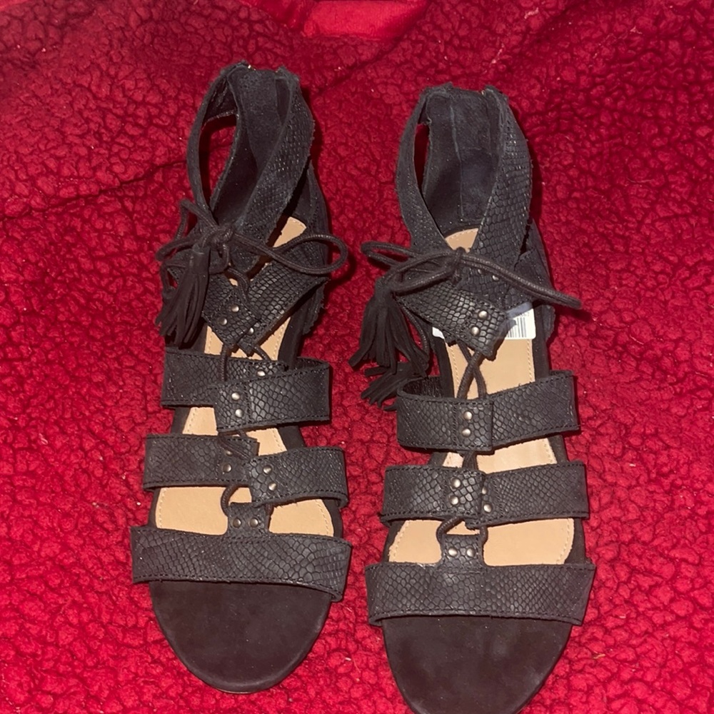 Women’s black lace-up wedges